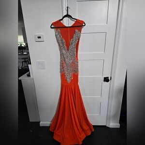Elegant Orange Evening Gown with Silver Accents